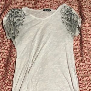 A white T-shirt with wings
